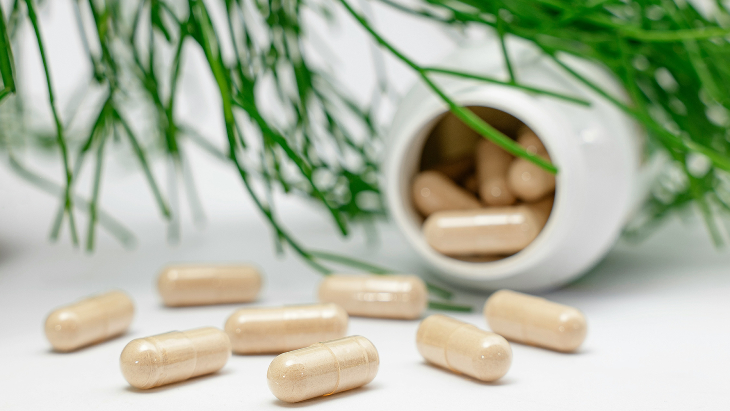 Bottle Spilling Magnesium Supplement Pills