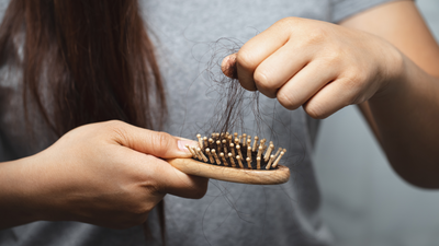 7 Ways To Stop Hair Shedding, According To The Research