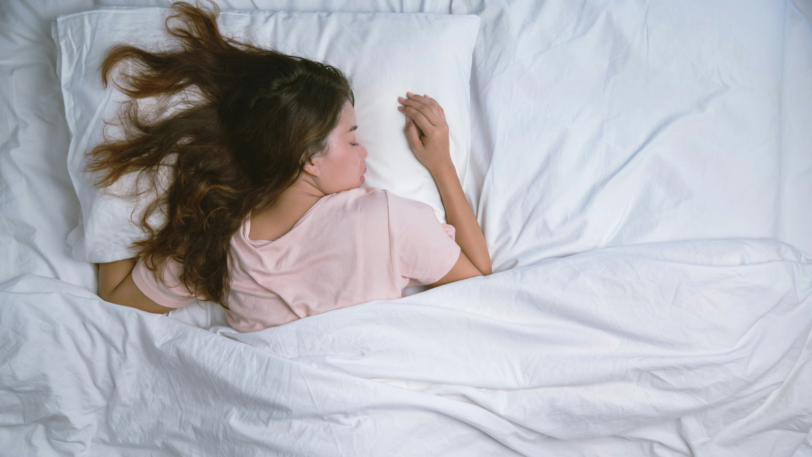 Woman Sleeping On Her Stomach