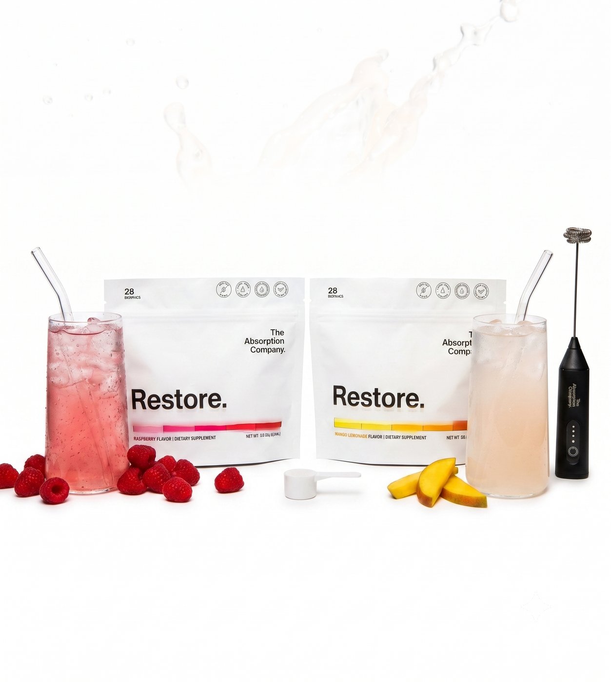 Restore Raspberry and Mango Lemonade bags with their prepared drinks, frother, and fresh fruit